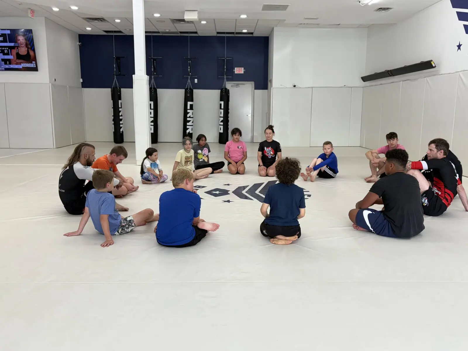 Egley Train Academy coaches lead a kids American Jiu-Jitsu class in Boise