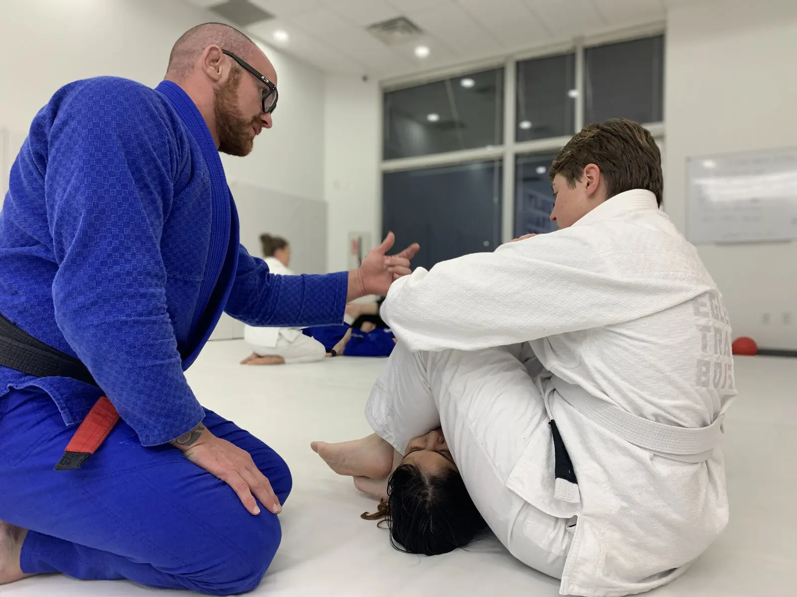 Coach Michael Egley coaching an American Jiu-Jitsu class at Egley Train Academy in Boise, Idaho