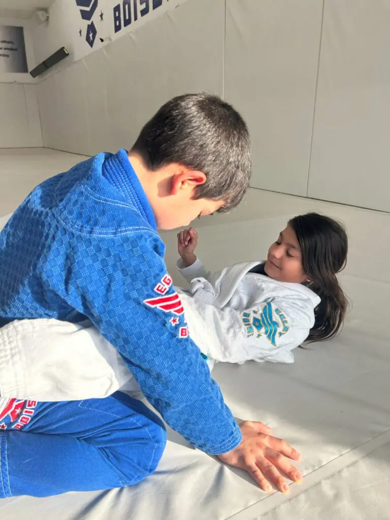 Kids jiu jitsu classes in Boise &mdash; two young students practicing at Egley Train Academy